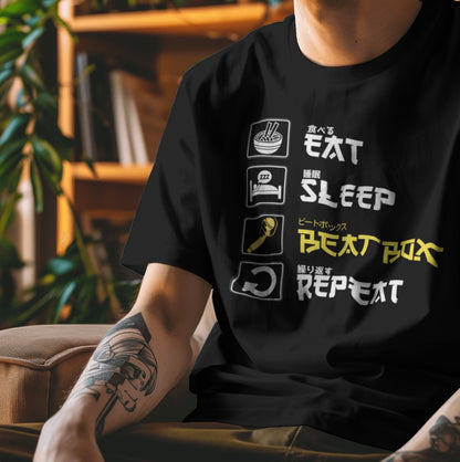 Person wearing a black t-shirt with graphic designs and text.