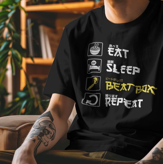 Person wearing a black t-shirt with graphic designs and text.