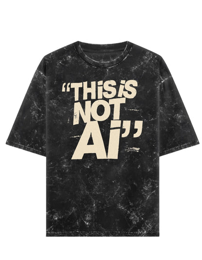 Black acid washed t-shirt with 'THIS IS NOT AI' text on a white background