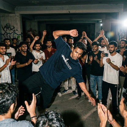 Dancer performing wearing Drummerkong oversized dancer t-shirt with 'dance' text 