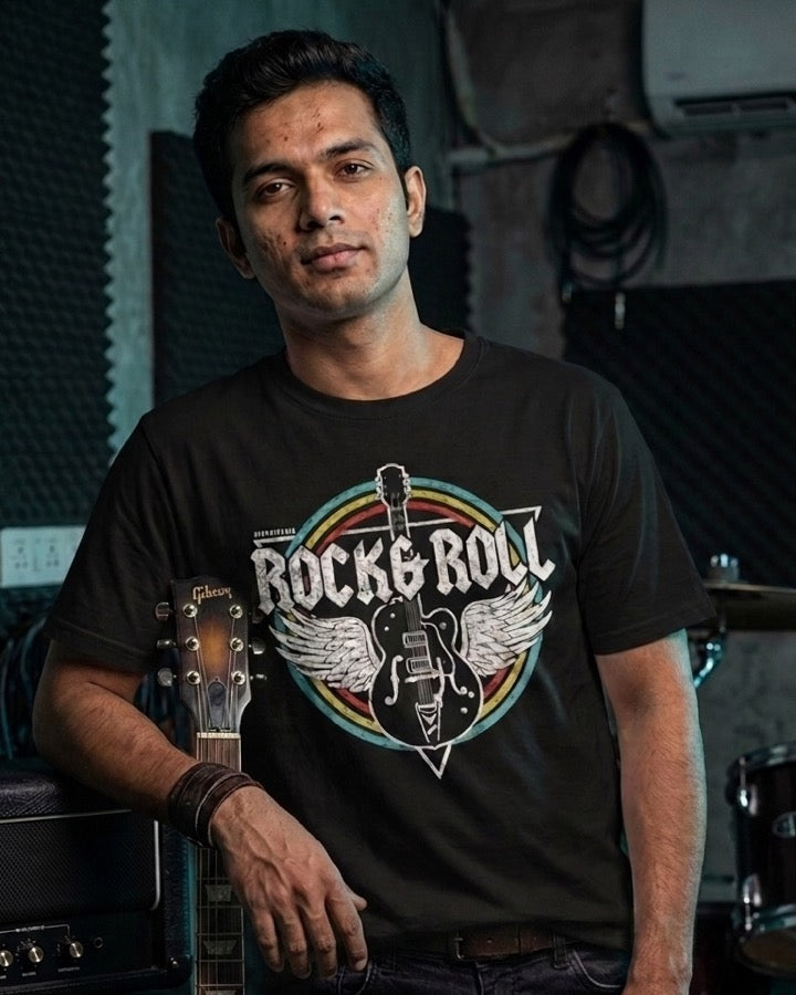 guitarist wearing drummerkong rock and roll tshirt