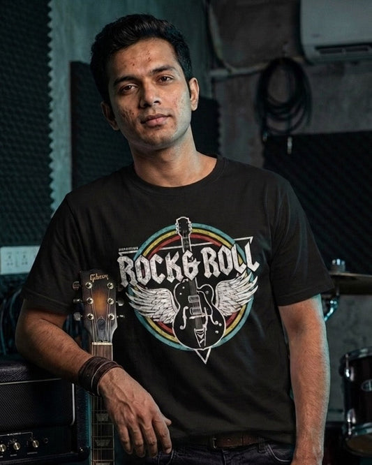 guitarist wearing drummerkong rock and roll tshirt