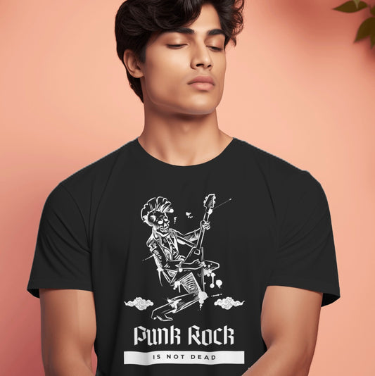 Person wearing a black t-shirt with a graphic design and text against a peach background
